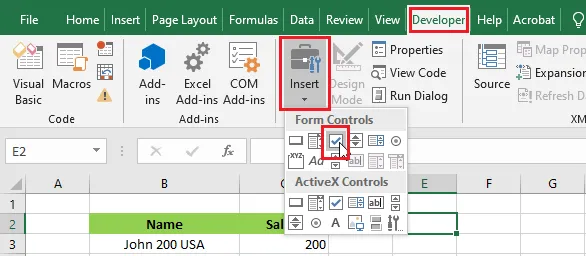 The Check Box button under Form Controls on the Developer tab